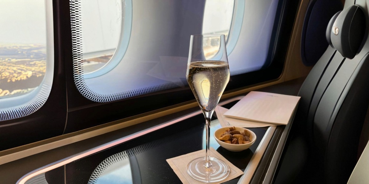 champagne on plane jet set mistress